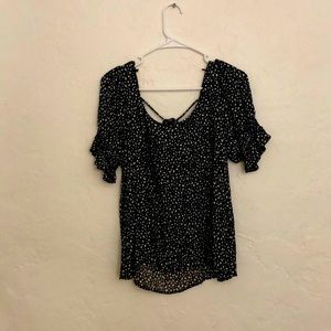 Nice dress shirt, cross cross in the back, designs on top of black, very elegant